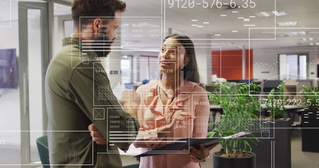 Business Professionals Analyzing Virtual Financial Data in Office