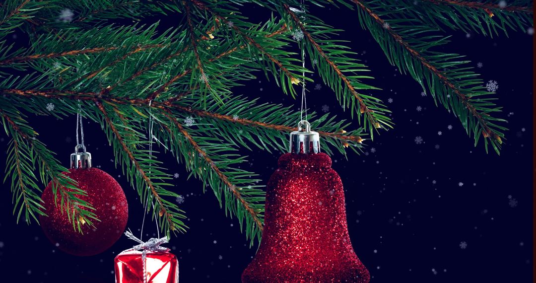 Festive Tree Branch with Glittering Red Decorations