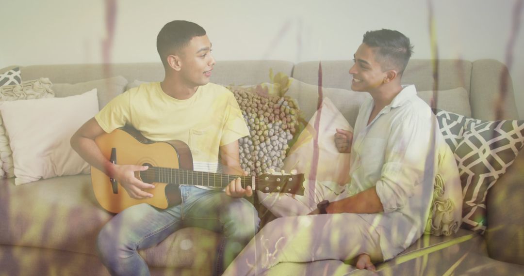Joyful Biracial Couple Enjoying Music at Home