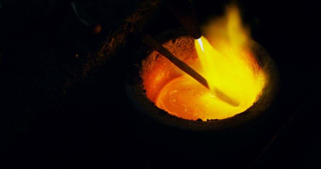 Molten Metal Pouring in Foundry with Glowing Heat - Free Images, Stock Photos and Pictures on Pikwizard.com