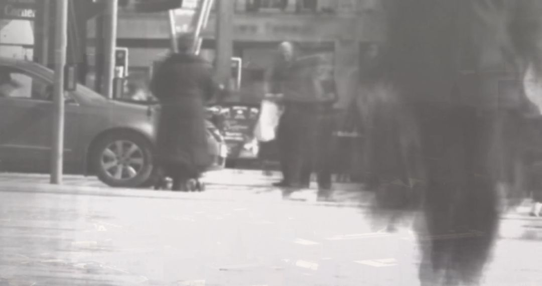 Blurred Motion Crowd in Busy Urban Street Setting