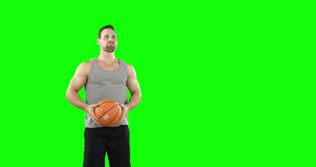 Man Holding Basketball on Green Screen Background - Free Images, Stock Photos and Pictures on Pikwizard.com