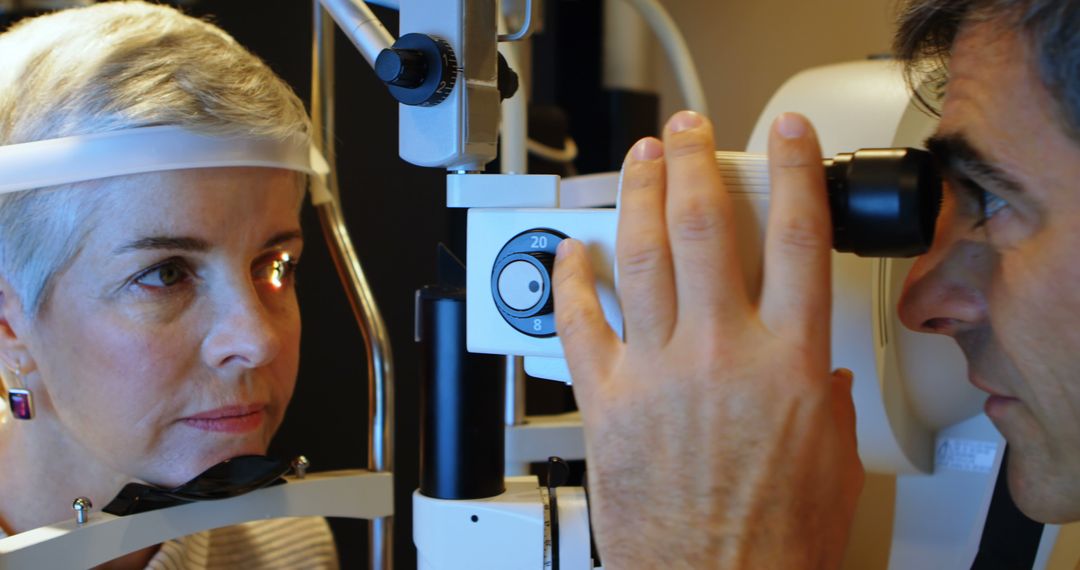 Woman Undergoing Eye Examination in Clinic - Free Images, Stock Photos and Pictures on Pikwizard.com