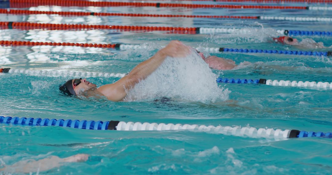 Competitive Swimmers Training in Indoor Pool - Free Images, Stock Photos and Pictures on Pikwizard.com