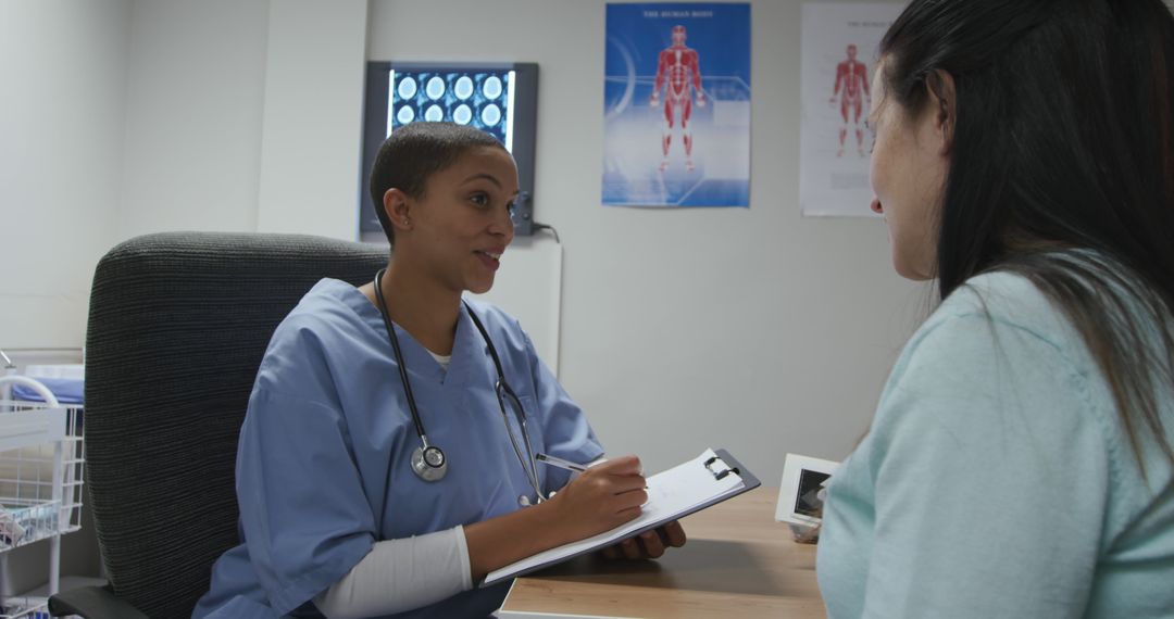 Nurse Discussing Healthcare Plan With Patient in Medical Office - Free Images, Stock Photos and Pictures on Pikwizard.com