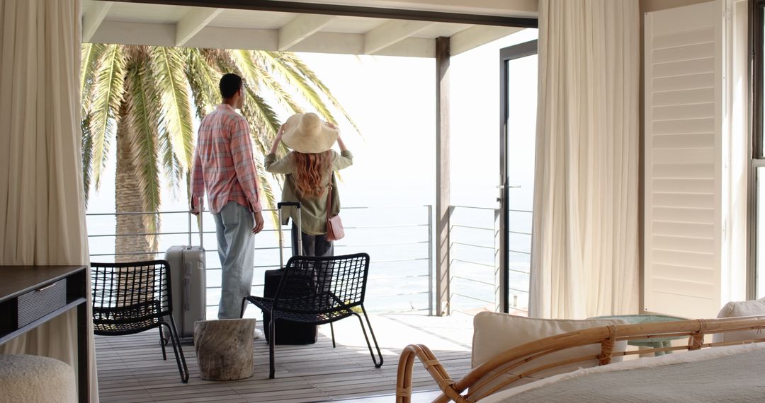 Couple Relaxing on Resort Terrace with Ocean View