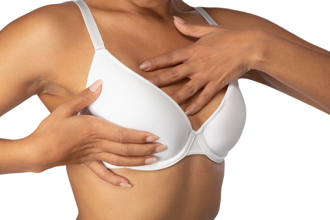 Unrecognizable woman performing breast self-exam in white bra on transparent background - Download Free Stock Images Pikwizard.com