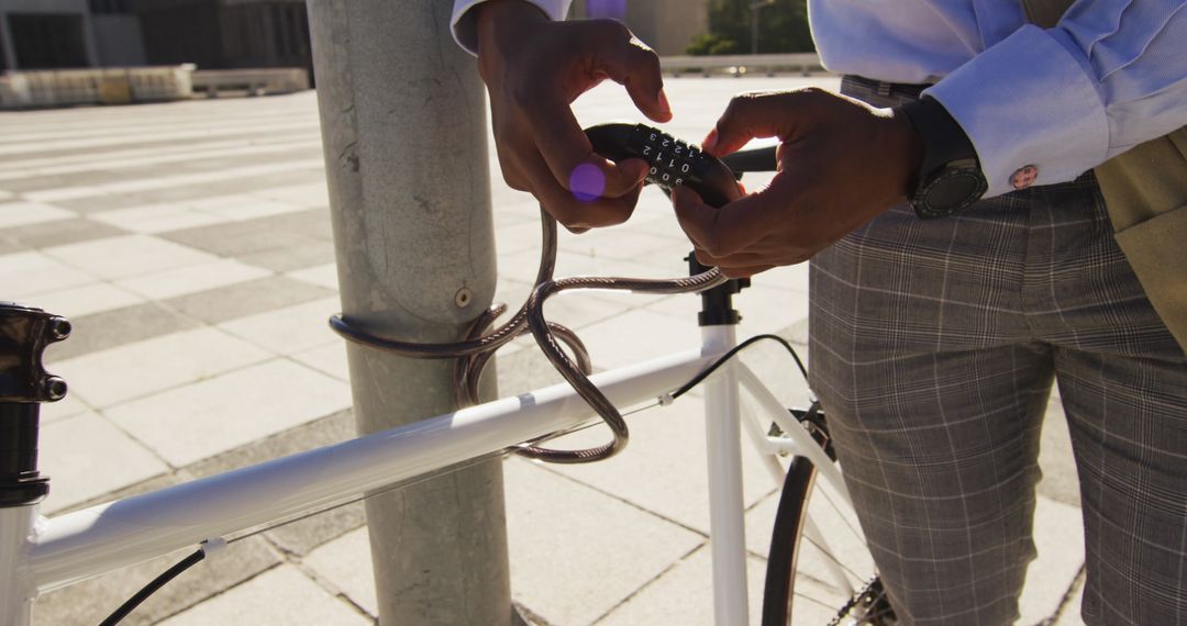 Closeup Bicycle Locking in Urban Setting by Professional