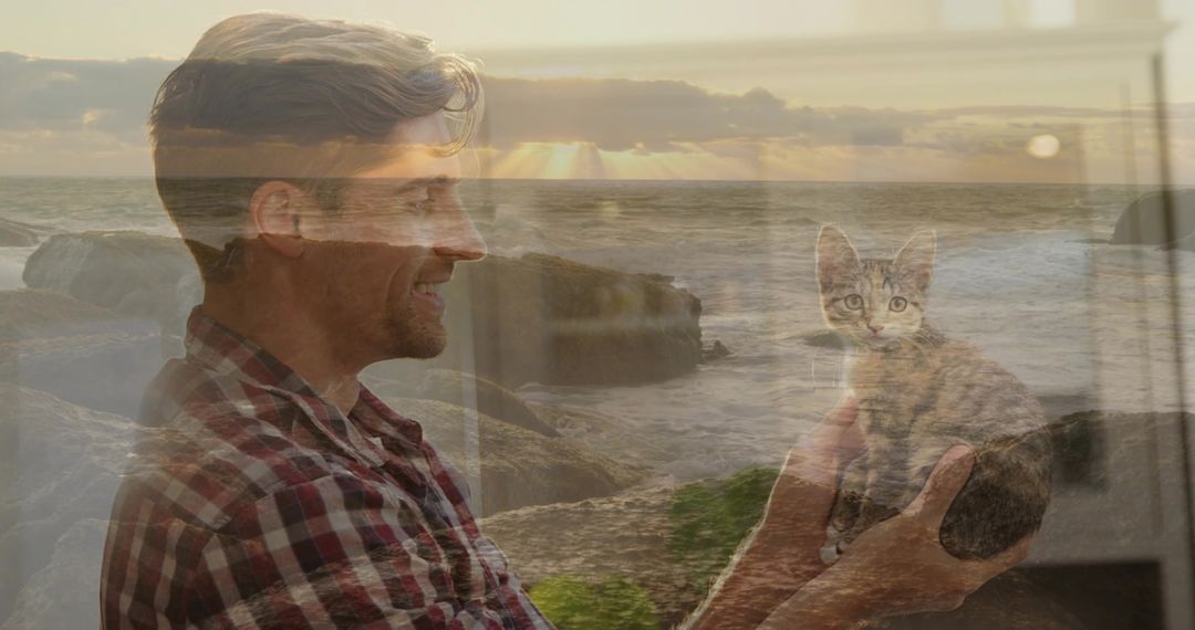 Man in Plaid Shirt with Cat Reflective Window Against Sunset Beach