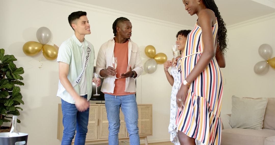 Diverse Friends Celebrating at Home with Drinks and Cake