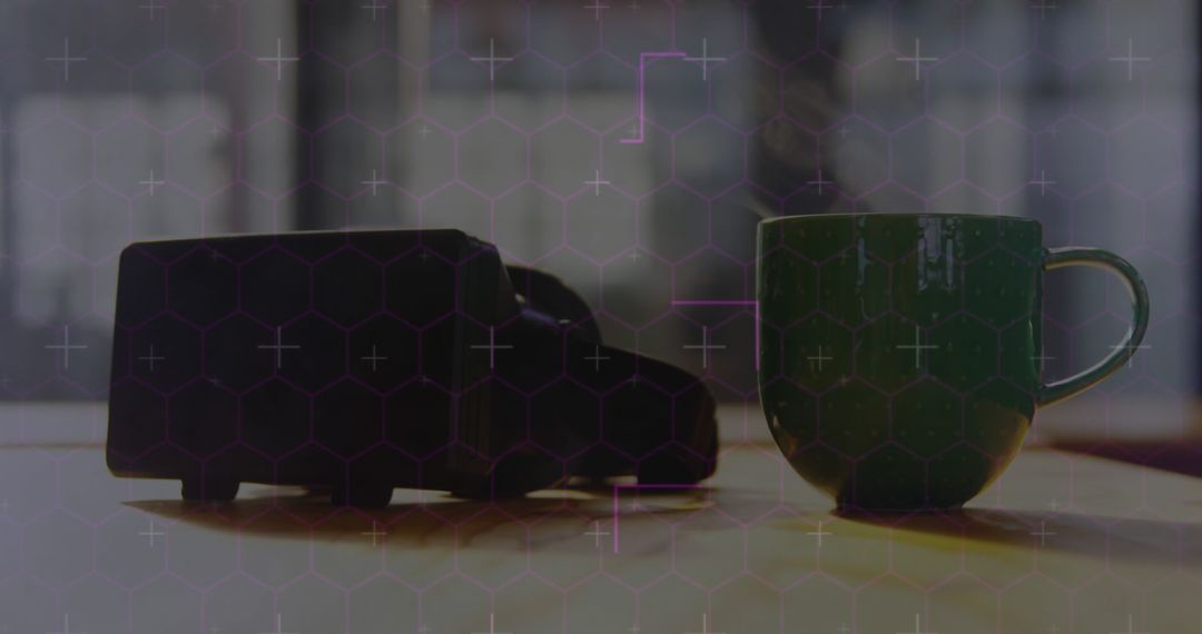 VR Headset and Coffee Mug on Table with Digital Overlay