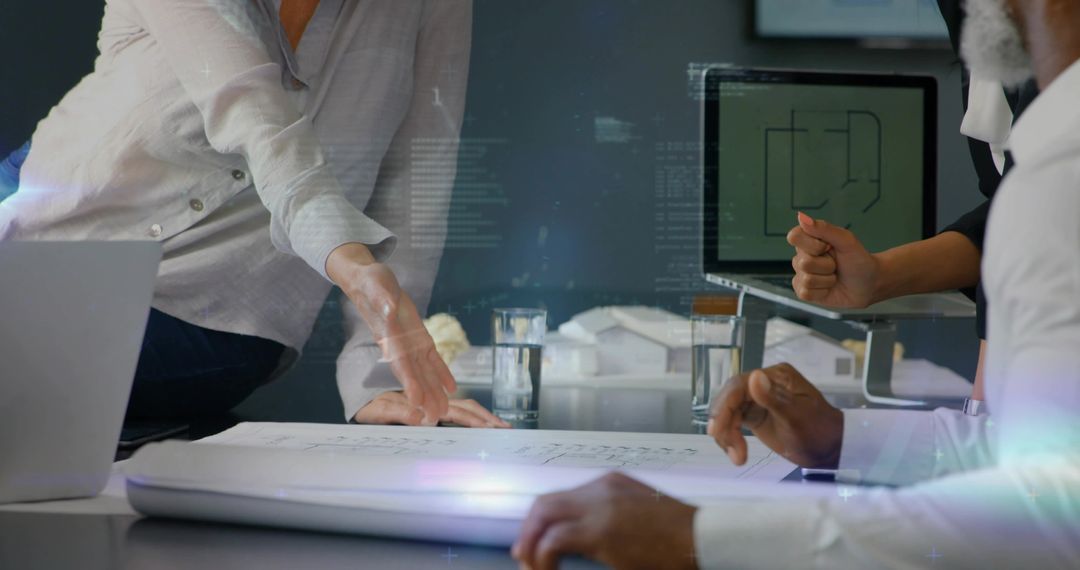 Architects Analyzing Blueprint in Modern Office Setting