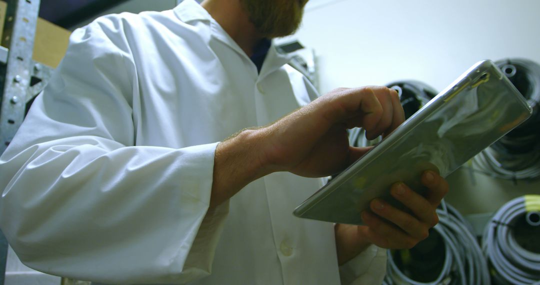 Scientist Using Digital Tablet in Laboratory for Data Collection - Free Images, Stock Photos and Pictures on Pikwizard.com