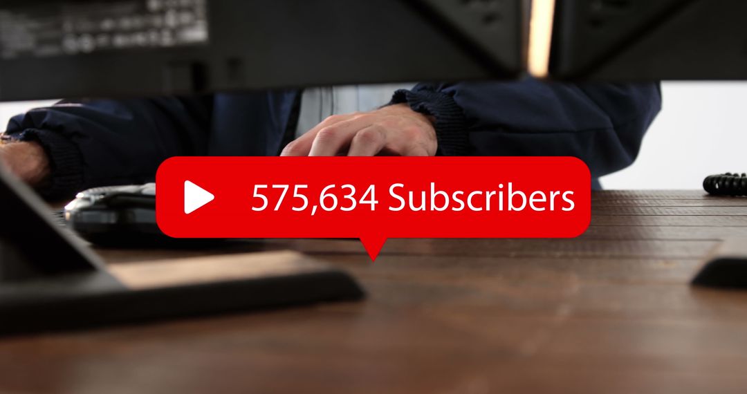 YouTube Subscriber Milestone Displayed on Keyboard With Speech Bubble
