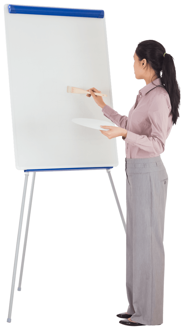 Businesswoman Engaging in Creative Painting Process on Transparent Canvas