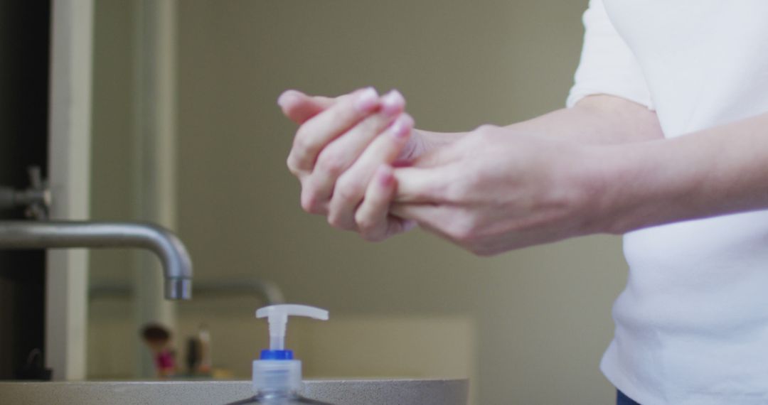 Person Washing Hands with Soap In Clean Bathroom - Free Images, Stock Photos and Pictures on Pikwizard.com