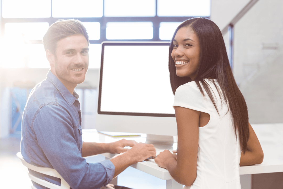 smiling colleagues by office computer with transparent screen - Download Free Stock Images Pikwizard.com