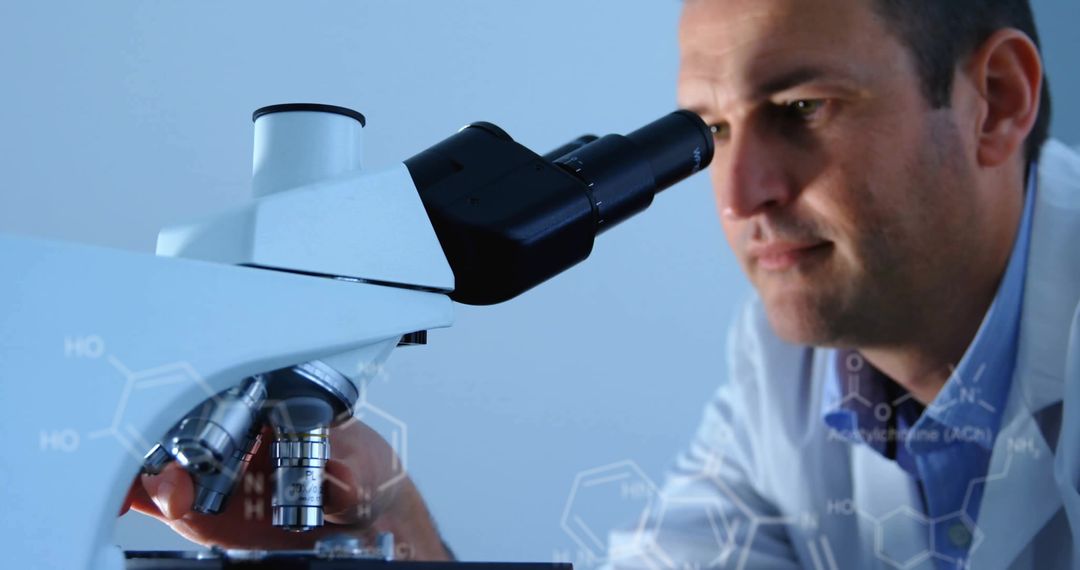 Scientist Conducting Research Through High-Tech Microscope Interface