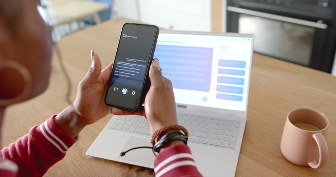 Woman Using Smartphone AI Chat App at Home by Laptop and Coffee