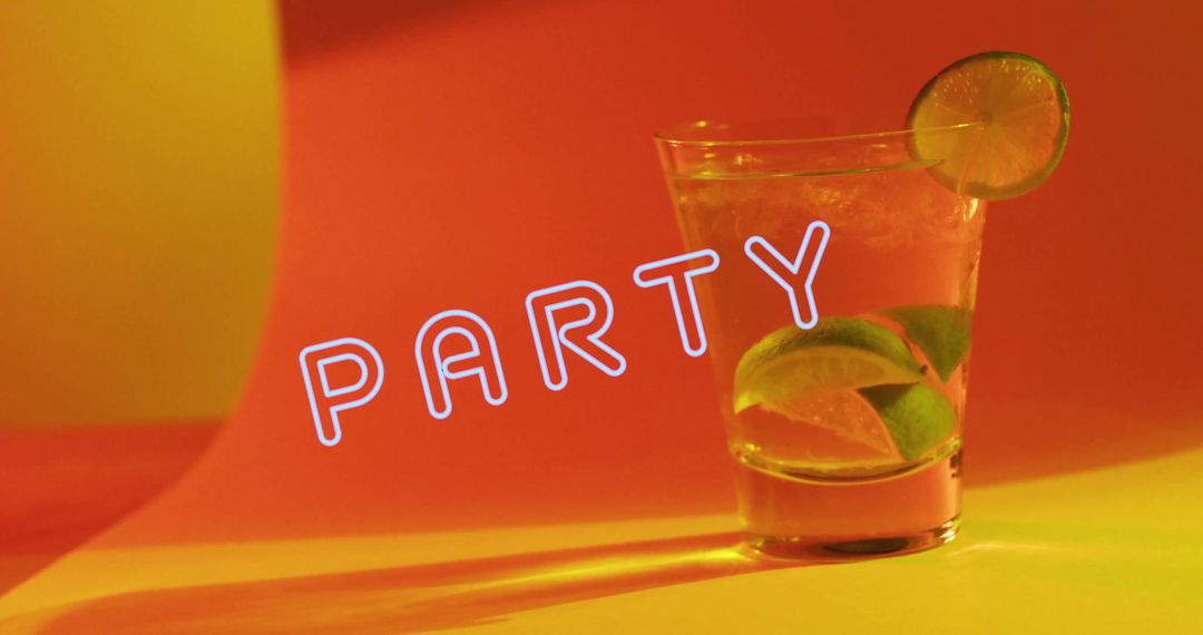 Bright Orange Party Cocktails with Neon Text and Citrus - Free Images, Stock Photos and Pictures on Pikwizard.com