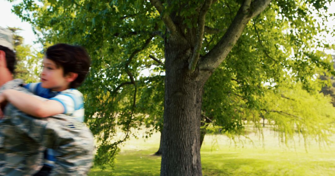 Army Soldier Enjoying Quality Time with Son in Park