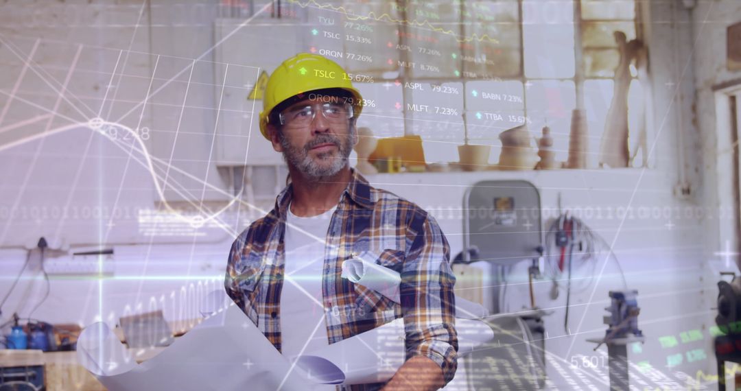 Engineer Analyzing Blueprints with Financial Overlay in Workshop