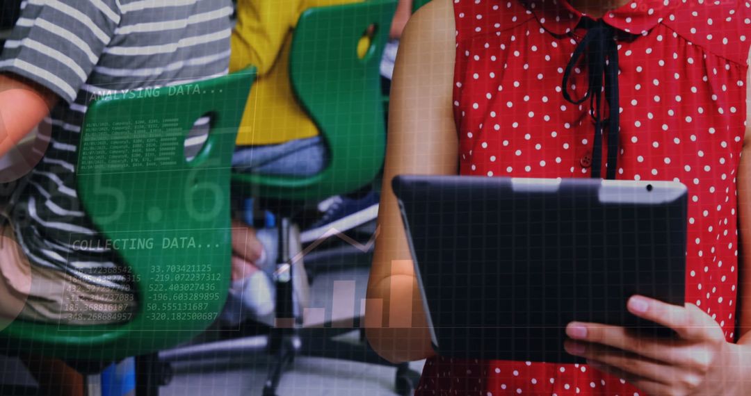 Students Engaged with Tablet Learning in Modern Classroom