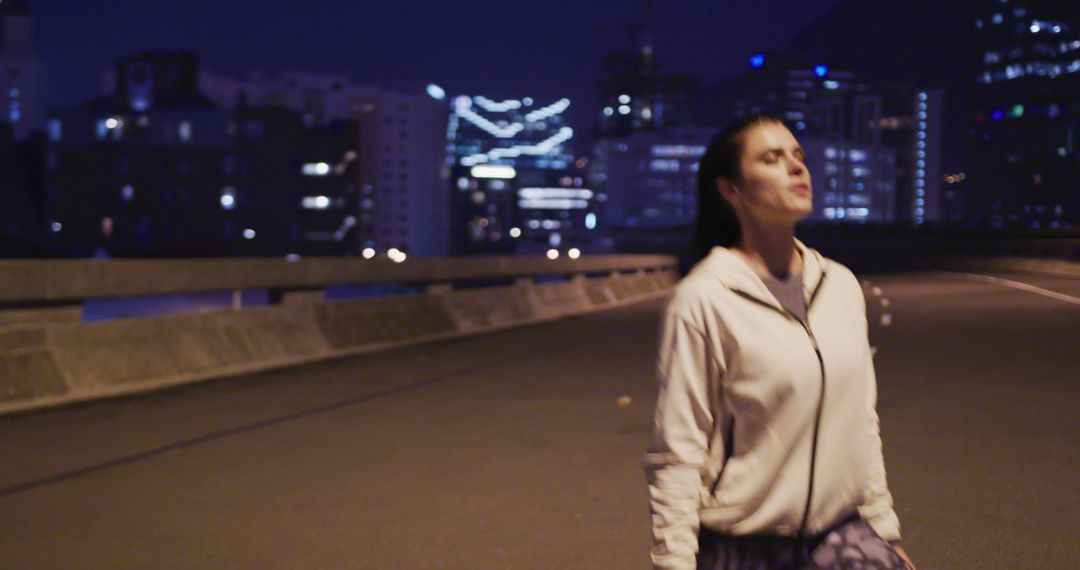 Jogger Enjoying Solitude on Empty Urban Street at Night - Free Images, Stock Photos and Pictures on Pikwizard.com