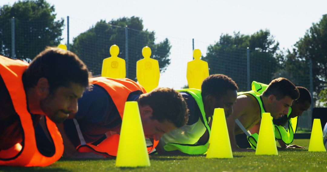 Soccer Players Training with Cones and Dummies on Field - Free Images, Stock Photos and Pictures on Pikwizard.com