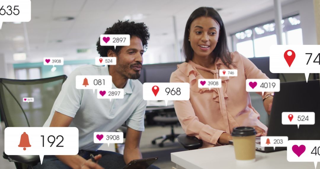 Coworkers Discussing Reports with Social Media Notifications Overlay