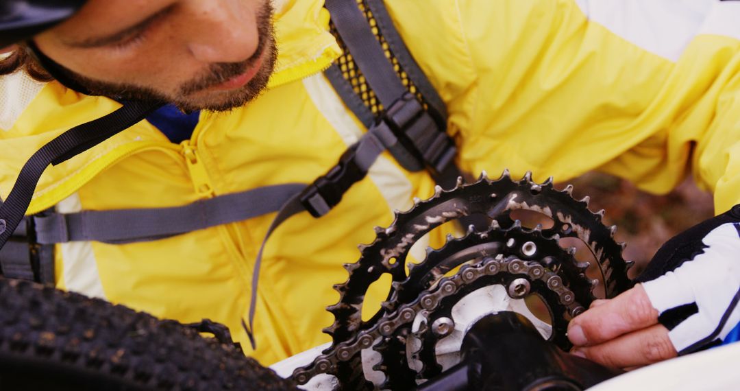 Man Repairing Bicycle Chain Outdoors - Free Images, Stock Photos and Pictures on Pikwizard.com