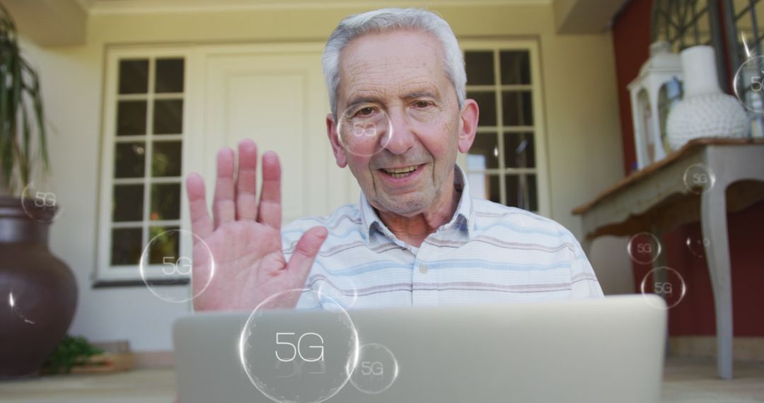 Senior Man Using Laptop with Digital 5G Interface