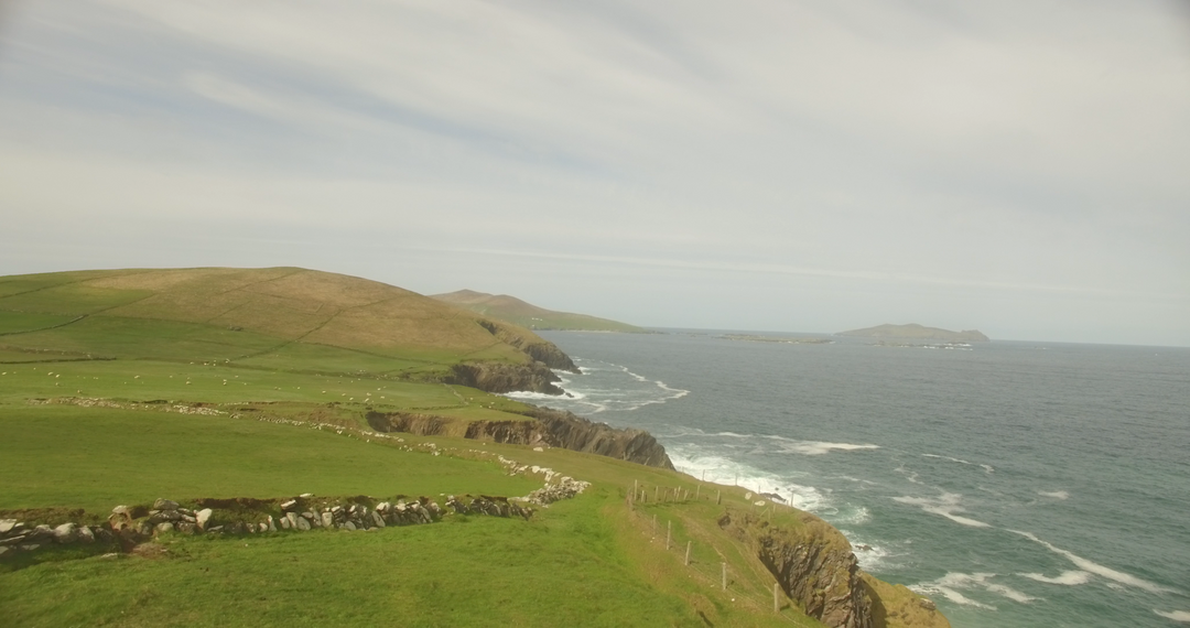 Serene Landscape of Cliffs by Transparent Ocean Under Clear Sky - Download Free Stock Images Pikwizard.com