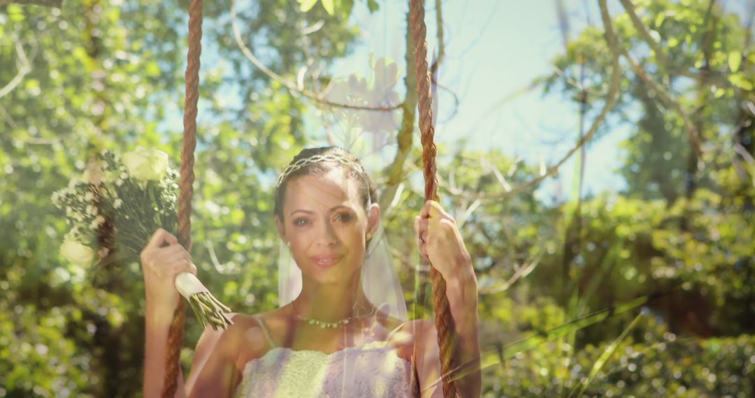 Radiant Bride Swinging in Sunshine with Bouquet in Garden