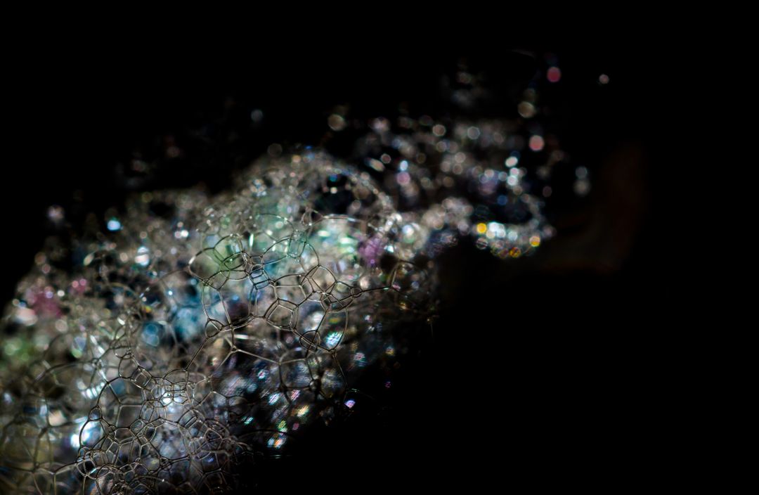 Abstract Macro Shot of Colorful Glittering Bubbles on Black Background - Free Images, Stock Photos and Pictures on Pikwizard.com