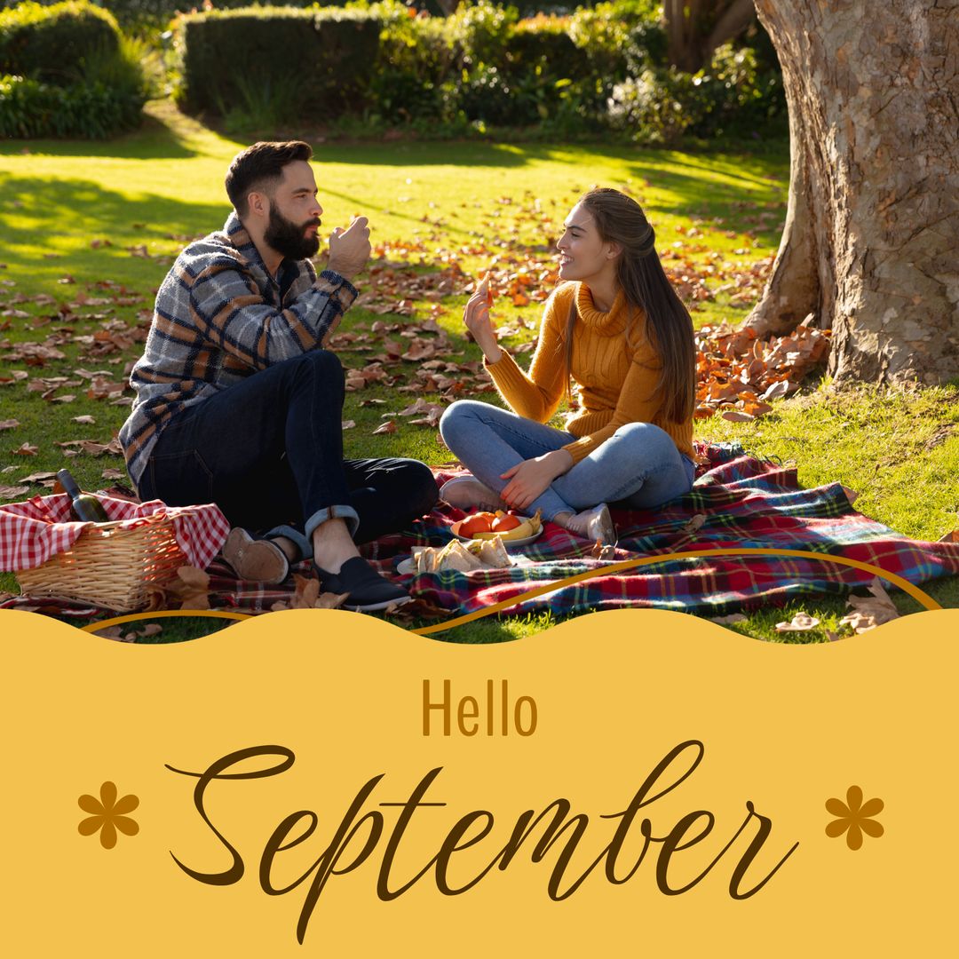 Hello september text in brown on yellow over happy caucasian couple eating food at picnic in park - Download Free Stock Templates Pikwizard.com