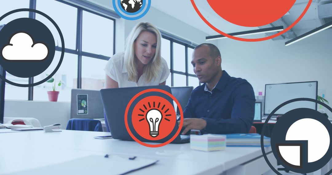 Creative Team Collaboration in Modern Office with Digital Graphics