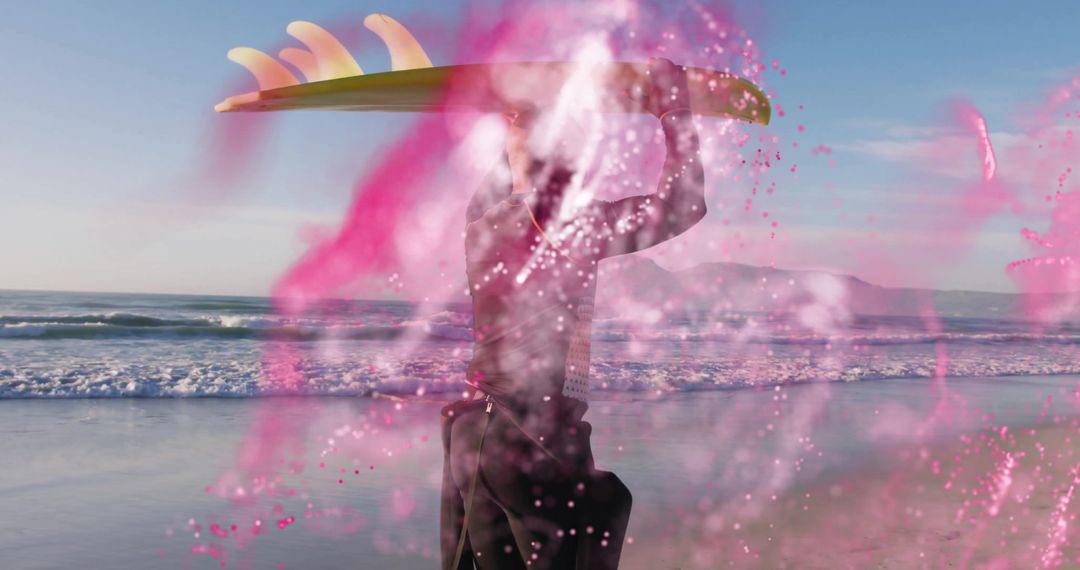 Surfer Carrying Board Through Vibrant Pink Powder on Beach