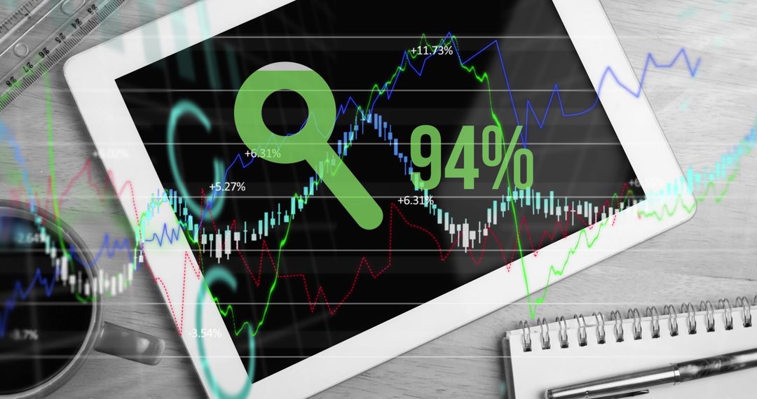 Tablet Displaying Financial Graph with Growing Percentage on Desk