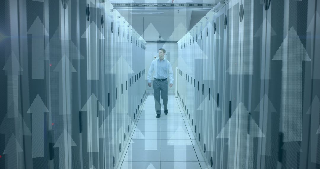 Businessman Walking Through Data Center with Digital Growth Arrows - Free Images, Stock Photos and Pictures on Pikwizard.com