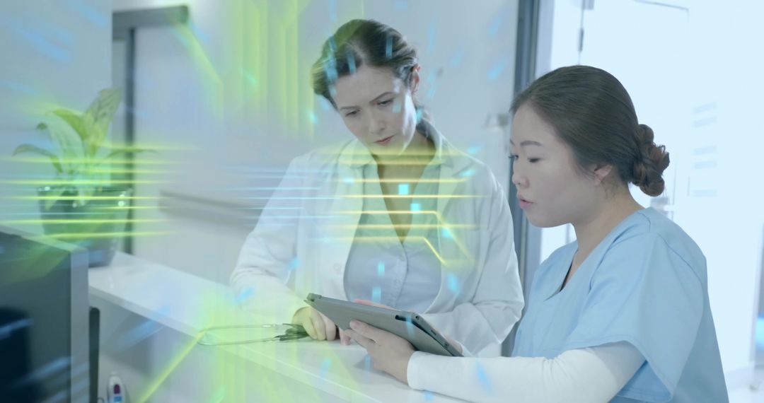 Medical Team Reviewing Digital Records on Tablet with Holographic Data Overlay