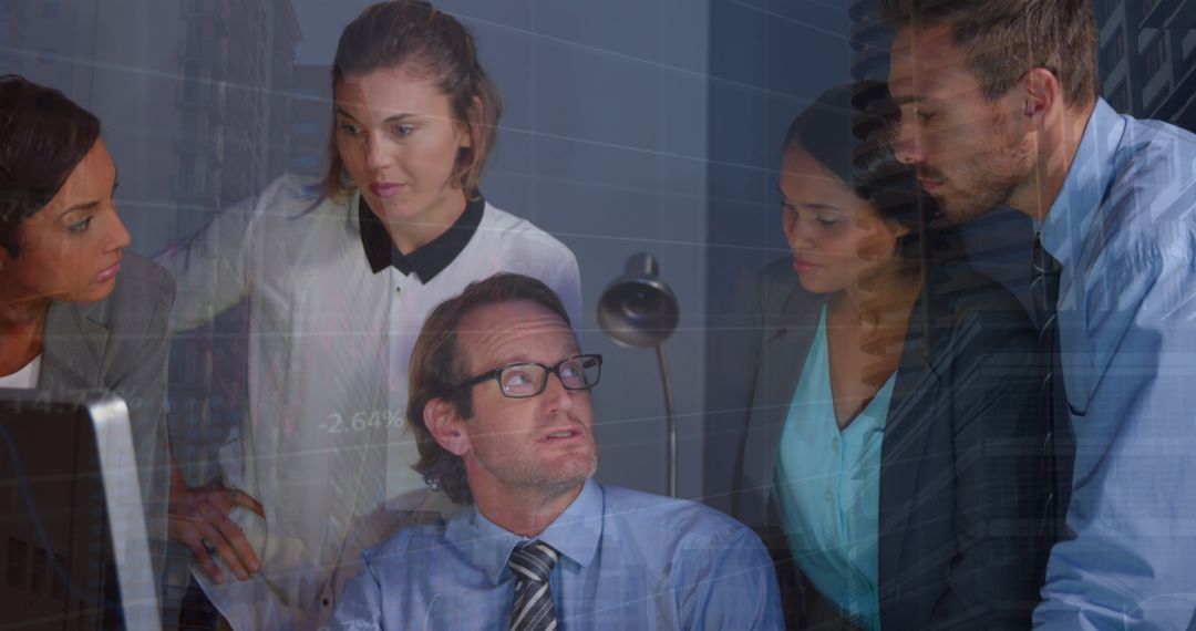 Diverse Team Analyzing Financial Data on Computer Screen