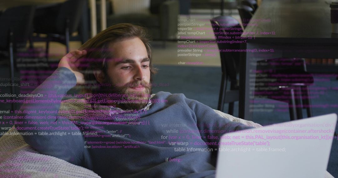 Casual Workspace Creativity with Bearded Developer and Laptop