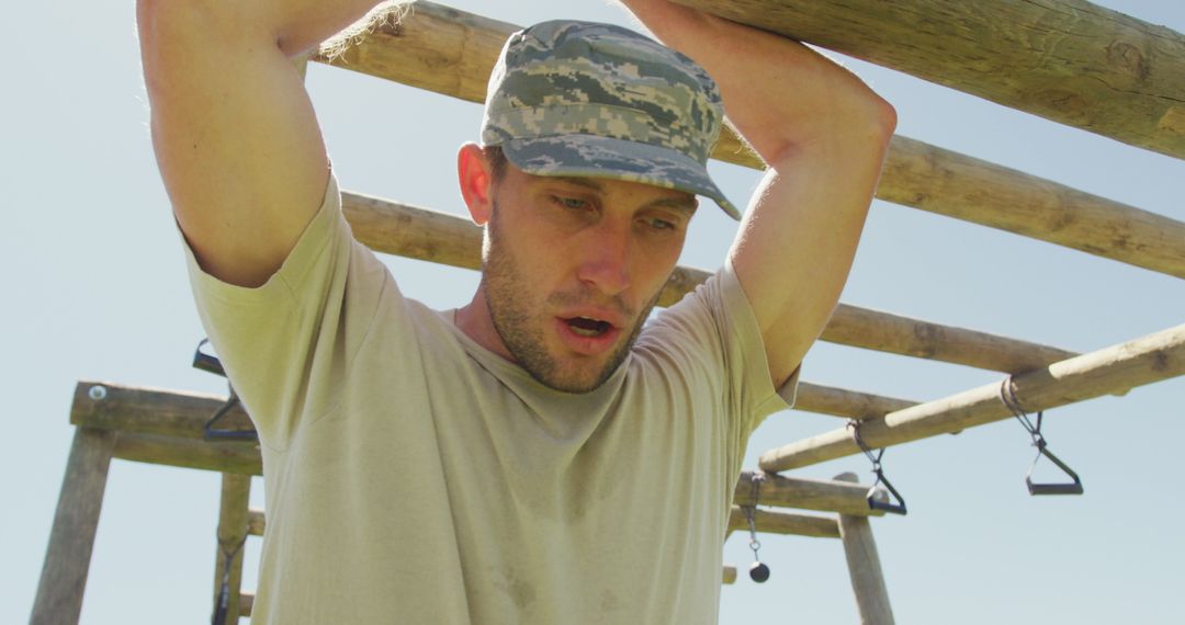 Determined Soldier Navigating Obstacle Course Outdoors