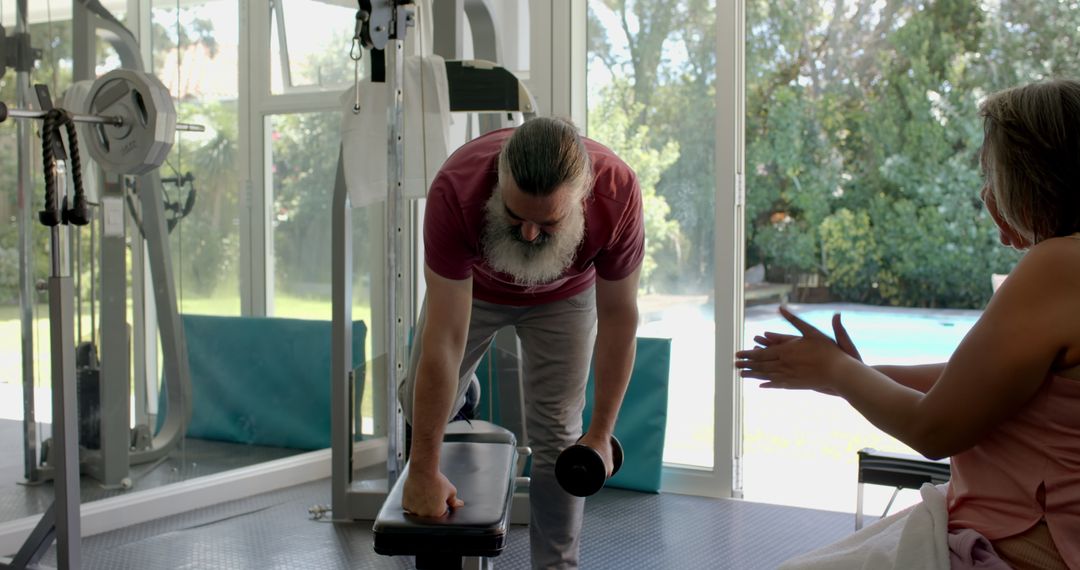 Senior Couple Enjoying Workout Routine in Home Gym