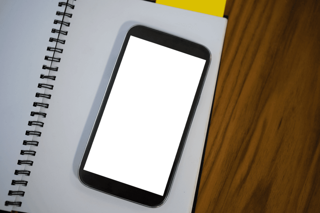 Mobile Phone and Blank Notepad on Office Table Transparent Background