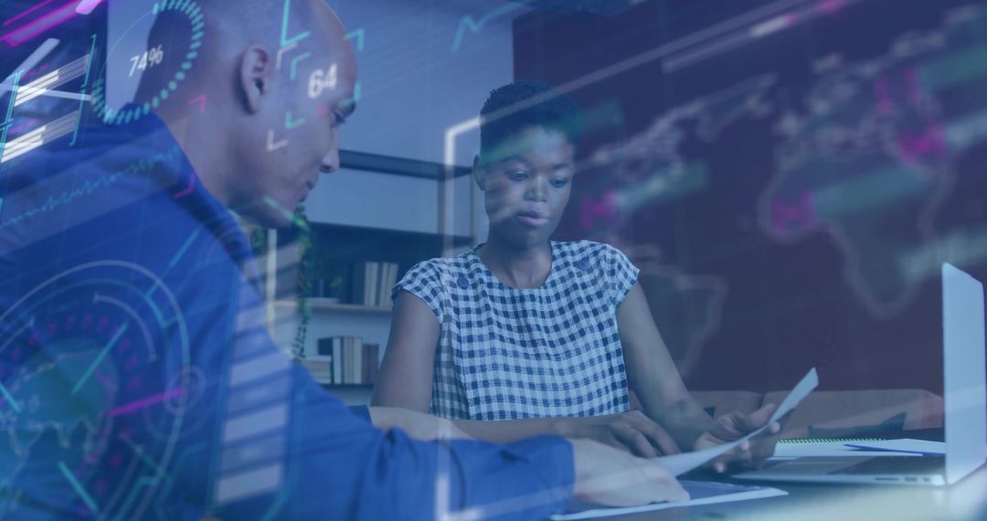 Business Colleagues Analyzing Reports with Futuristic Holographic Technology