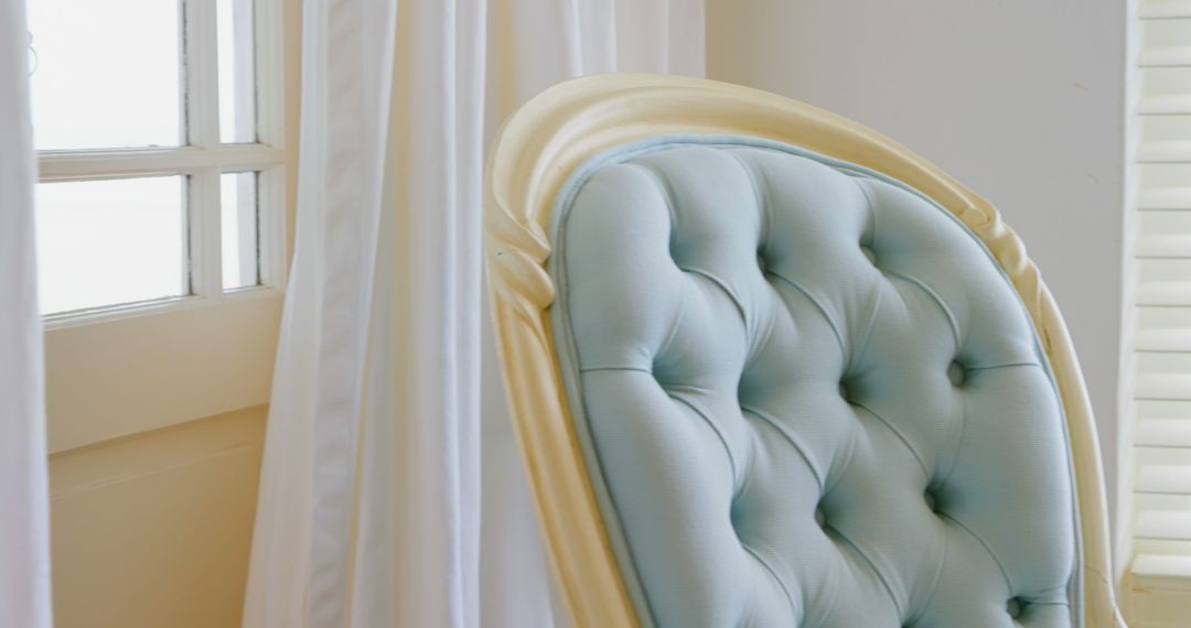 Luxurious Tufted Chair Near Window with Sheer Curtains - Free Images, Stock Photos and Pictures on Pikwizard.com