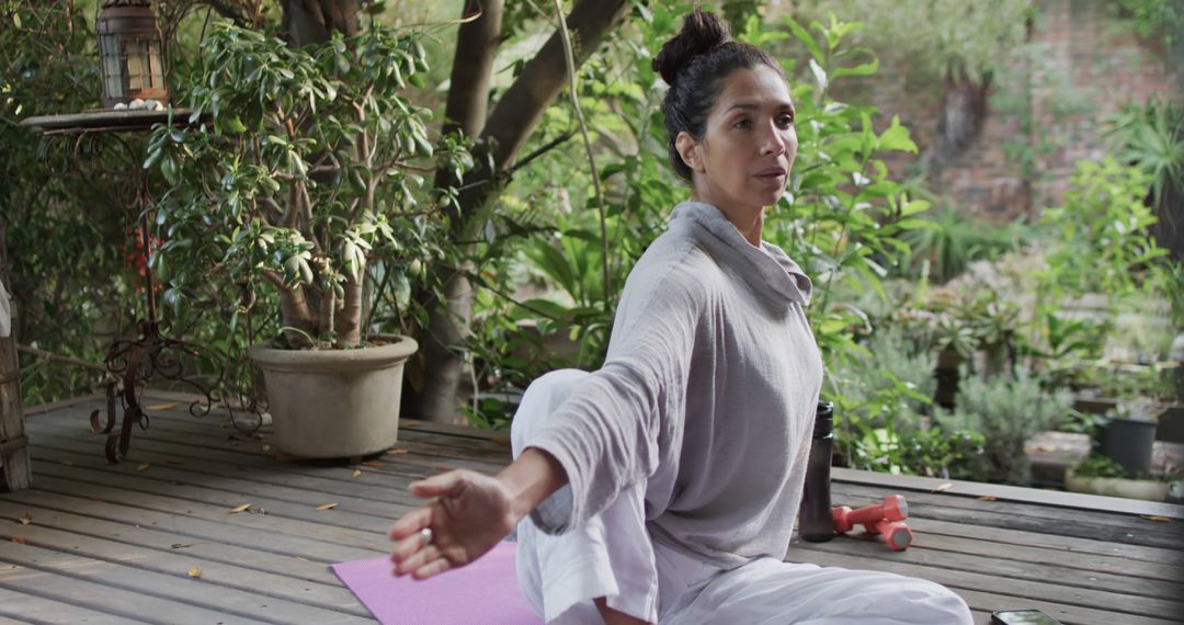 Woman Practicing Yoga Outdoors Amidst Lush Greenery - Free Images, Stock Photos and Pictures on Pikwizard.com