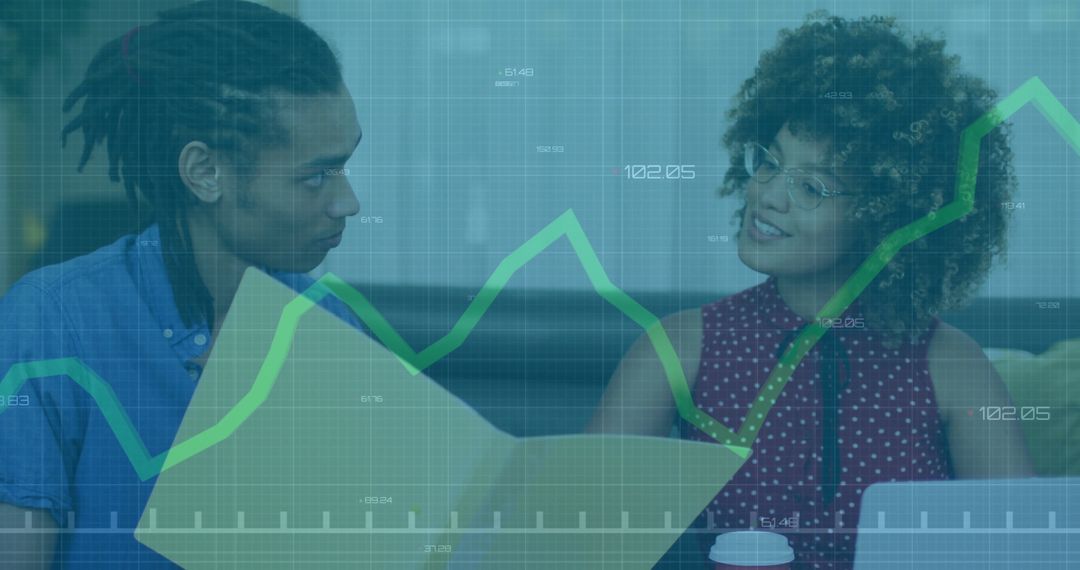 Colleagues Analyzing Business Data with Modern Charts and Technology